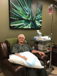 Dr. Fred Arnold receiving a Regenerative Joint & Tissue IV